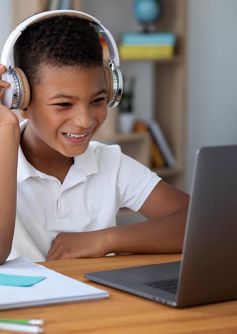 A child attending online Quran classes at Muhammadan Quran School