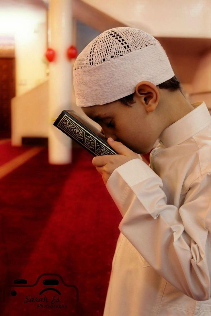 A Child is Getting Ready for Online Quran Classes